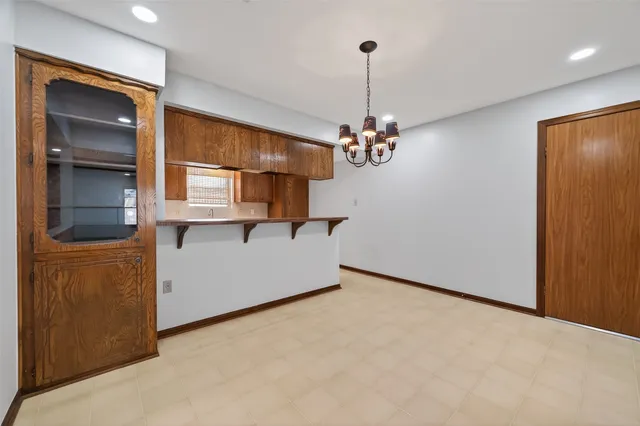 a very nice looking room with a chandelier