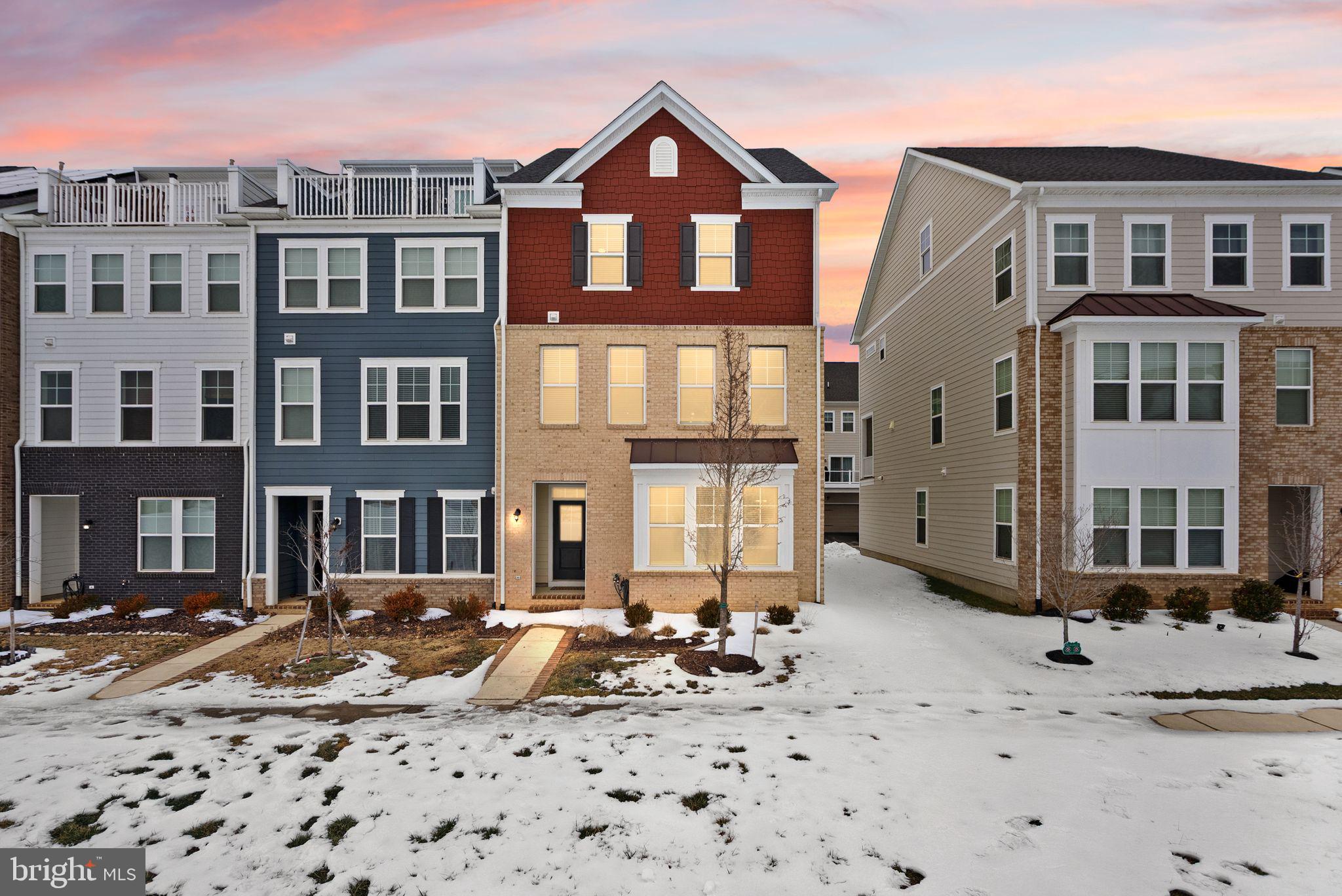 a front view of a building with lot of windows