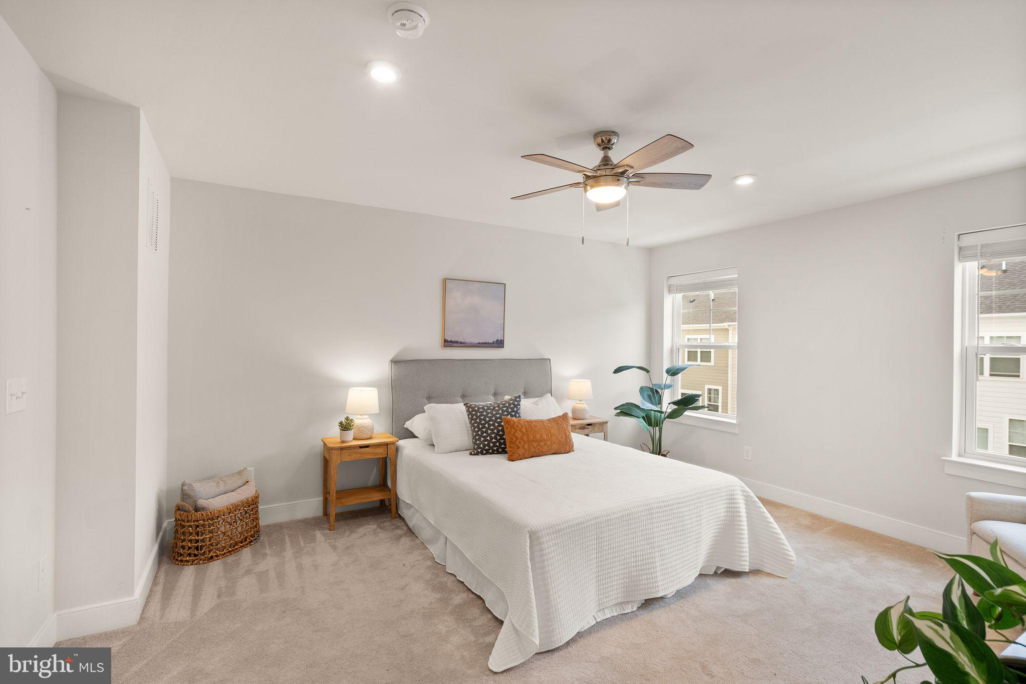 17762 Kingfisher Isle Road Dumfries, VA 22026 - Photo 23 of 62 a bed room with a bed and a chandelier