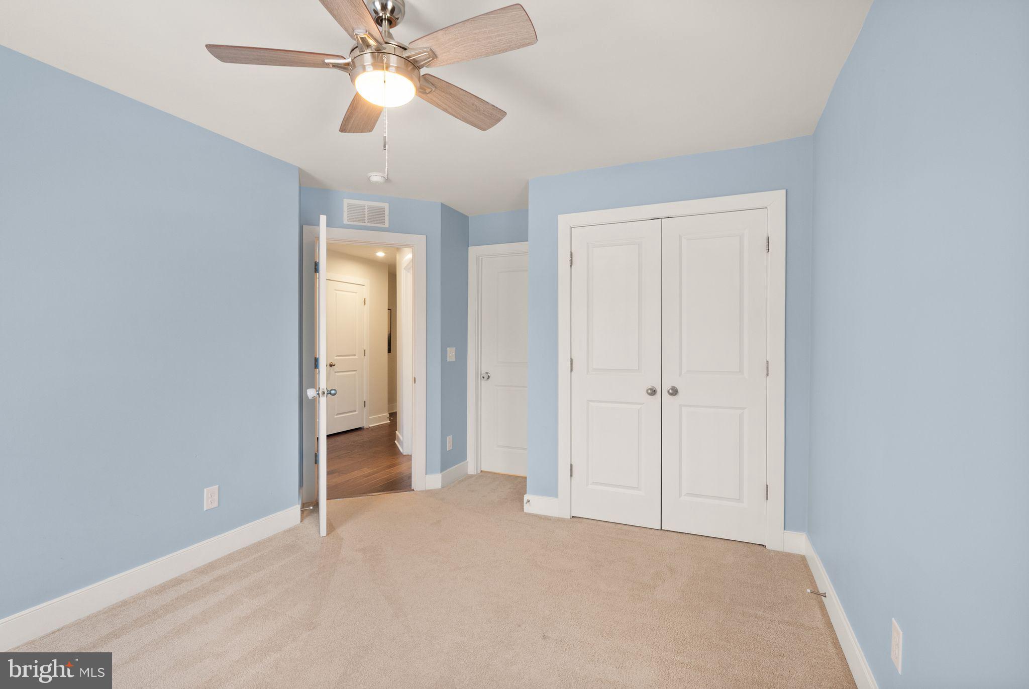 17762 Kingfisher Isle Road Dumfries, VA 22026 - Photo 35 of 62 a view of an empty room and chandelier fan