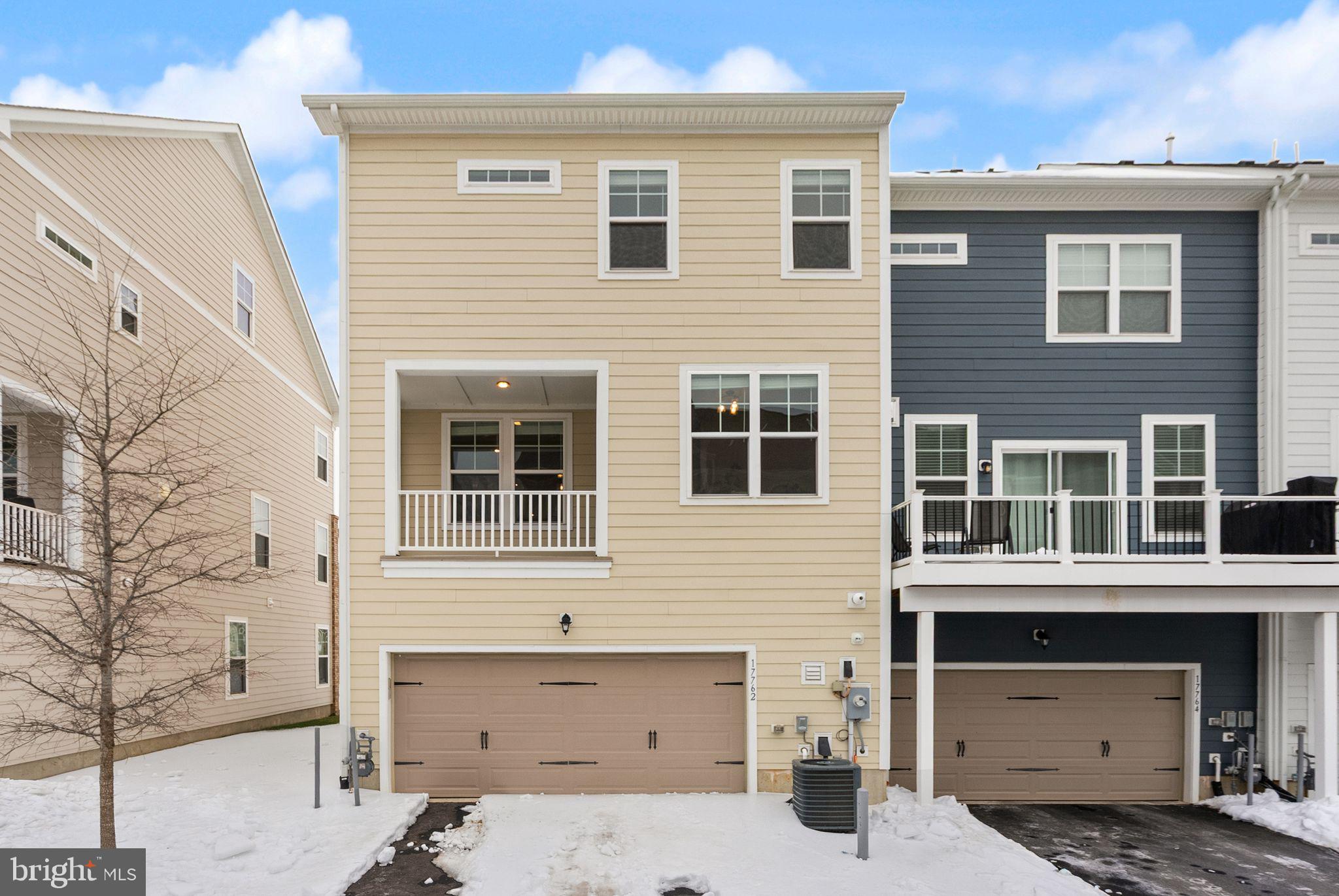 17762 Kingfisher Isle Road Dumfries, VA 22026 - Photo 46 of 62 a front view of a house with a garage