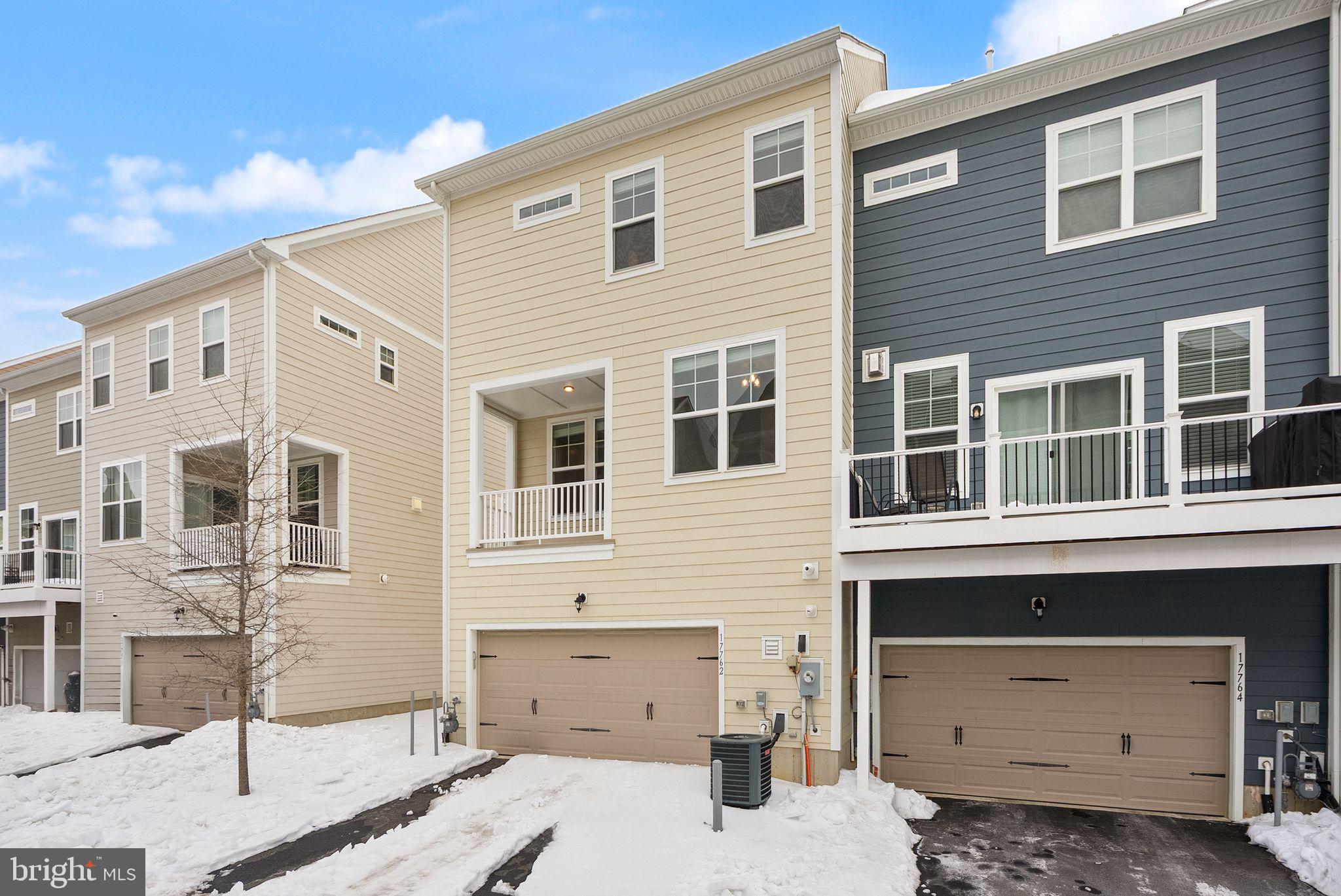 17762 Kingfisher Isle Road Dumfries, VA 22026 - Photo 47 of 62 a front view of a house with a yard