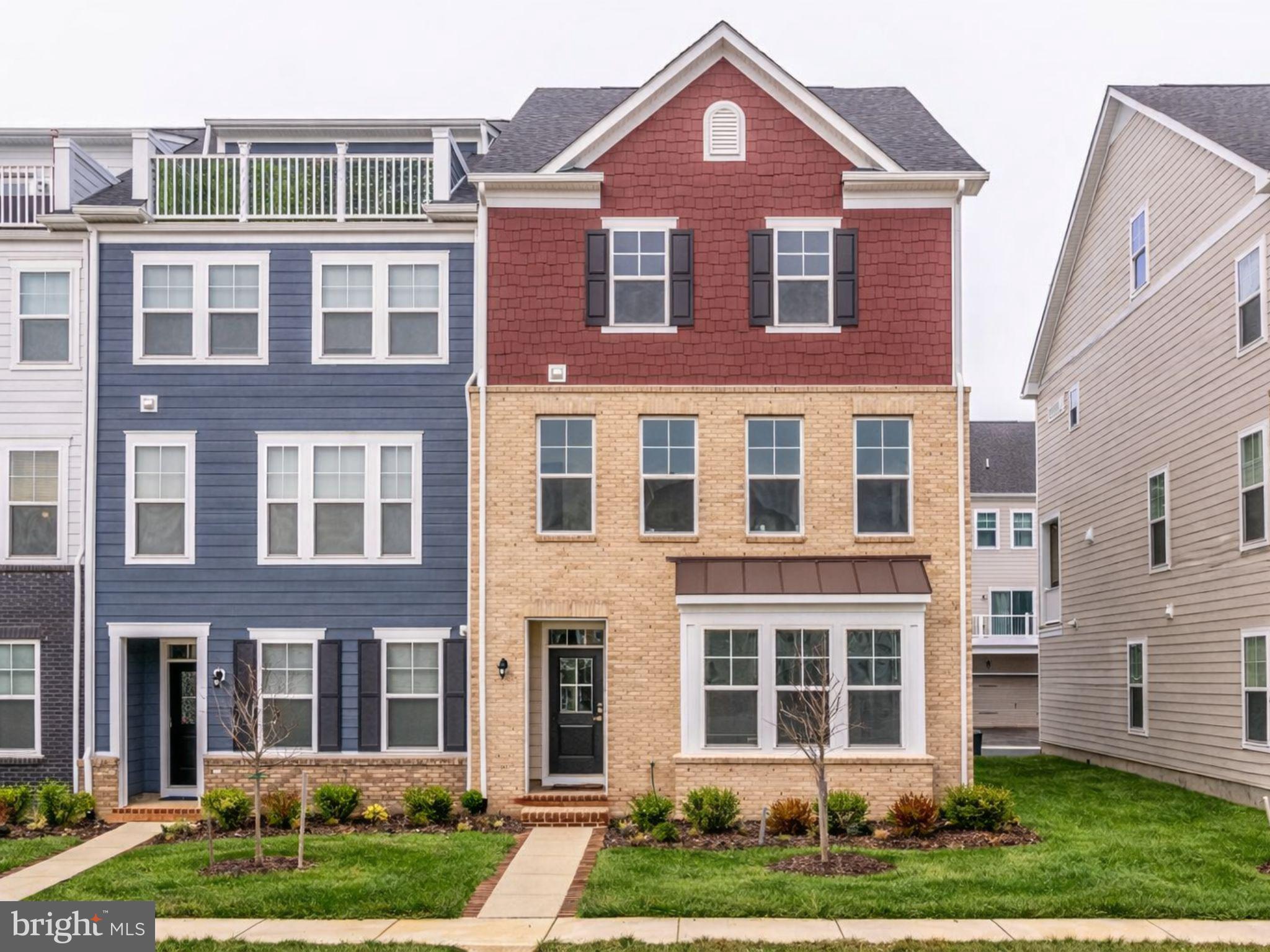 17762 Kingfisher Isle Road Dumfries, VA 22026 - Photo 60 of 62 a front view of a house with a yard