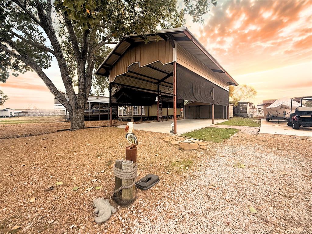 Tbd Lot 46 Tbd Isle Kerens, TX 75144 - Photo 3 of 5 a view of a backyard with a large tree