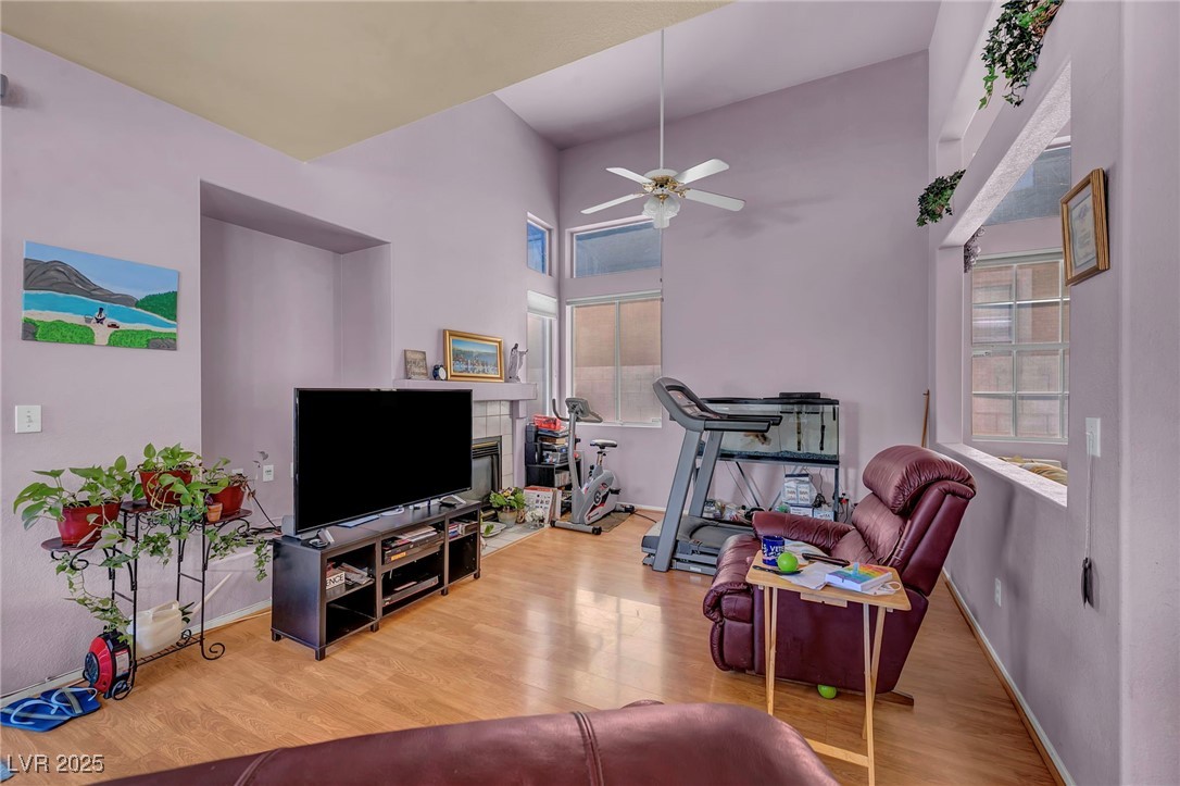 2180 Polynesia Circle Henderson, NV 89074 - Photo 11 of 53 Living room with wood finished floors, a ceiling f
