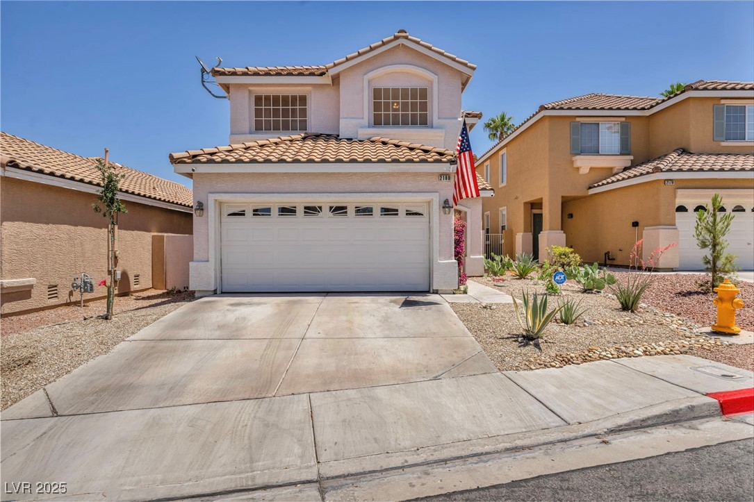2180 Polynesia Circle Henderson, NV 89074 - Photo 2 of 53 Mediterranean / spanish home featuring stucco sidi