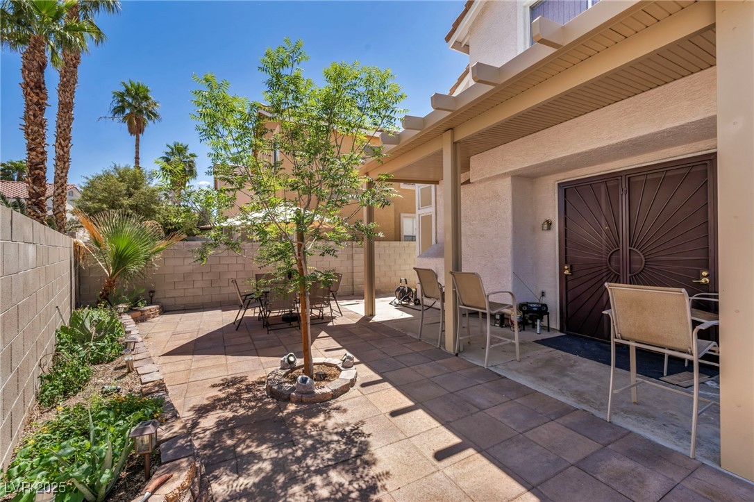 2180 Polynesia Circle Henderson, NV 89074 - Photo 28 of 53 View of patio featuring a fenced backyard and outd