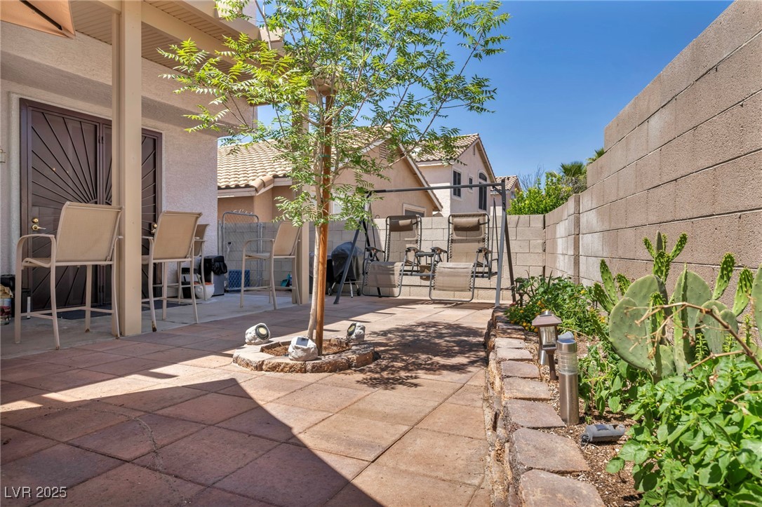 2180 Polynesia Circle Henderson, NV 89074 - Photo 33 of 53 View of patio featuring a fenced backyard