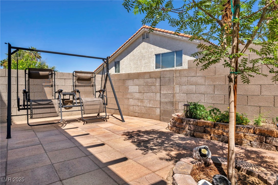 2180 Polynesia Circle Henderson, NV 89074 - Photo 36 of 53 View of patio / terrace featuring a fenced backyar