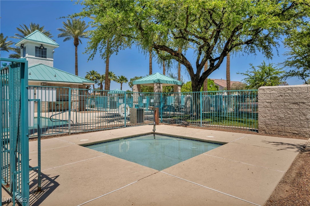 2180 Polynesia Circle Henderson, NV 89074 - Photo 40 of 53 Community pool featuring fence