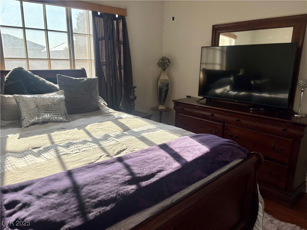 2180 Polynesia Circle Henderson, NV 89074 - Photo 48 of 53 Bedroom featuring wood finished floors