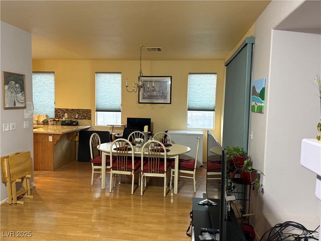 2180 Polynesia Circle Henderson, NV 89074 - Photo 51 of 53 Dining room with light wood-style floors