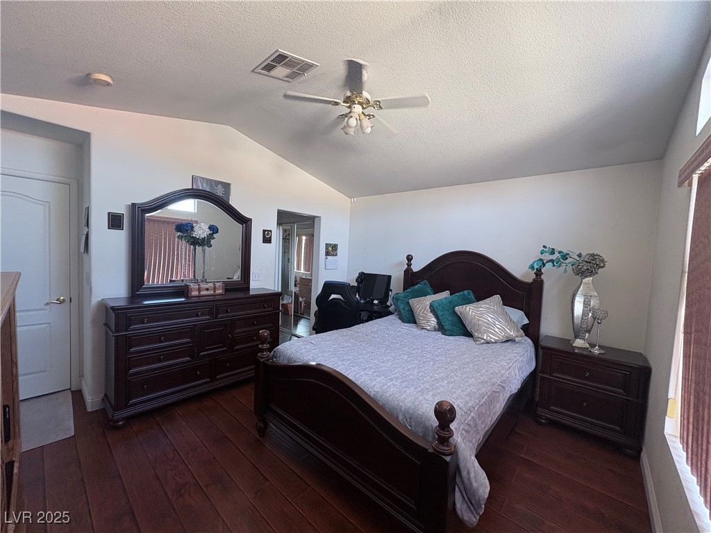 2180 Polynesia Circle Henderson, NV 89074 - Photo 53 of 53 Master Bedroom with vaulted ceiling, dark wood-sty