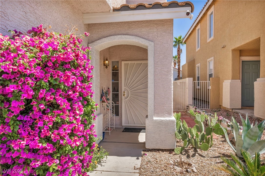 2180 Polynesia Circle Henderson, NV 89074 - Photo 6 of 53 Property entrance with stucco siding
