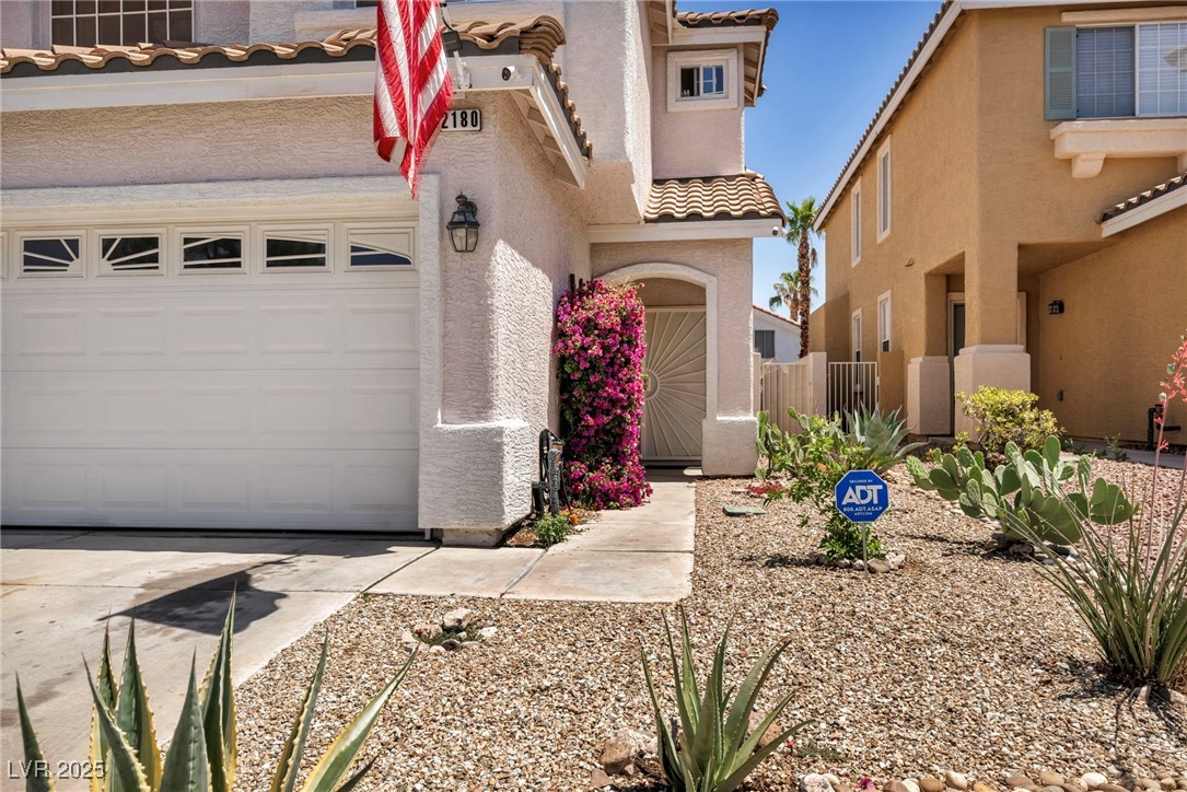 2180 Polynesia Circle Henderson, NV 89074 - Photo 7 of 53 Mediterranean / spanish house featuring a tile roo