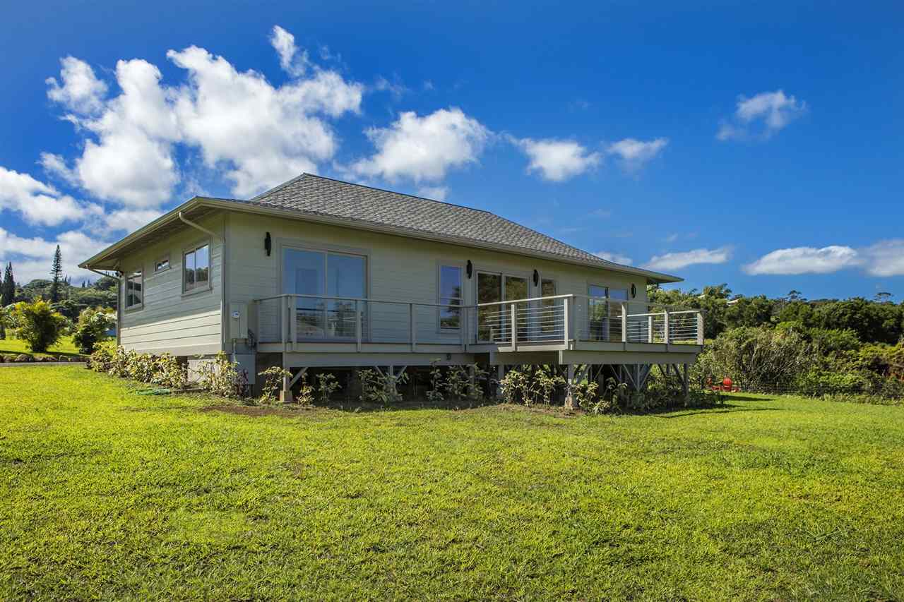 1351 Hookili Road, Unit A Haiku, HI 96708 - Photo 27 of 29 a front view of a house with a yard