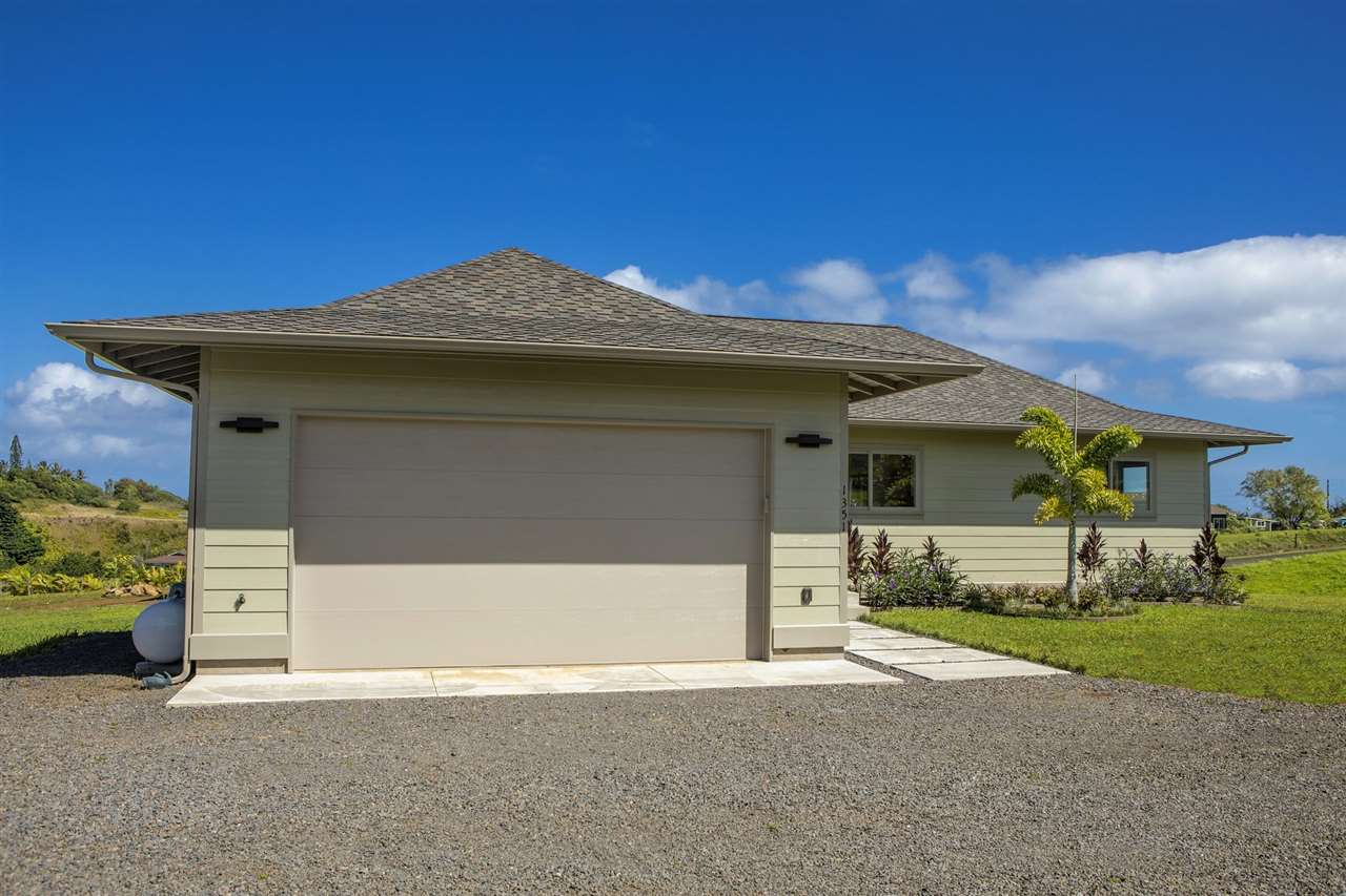 1351 Hookili Road, Unit A Haiku, HI 96708 - Photo 28 of 29 a front view of a house with a yard
