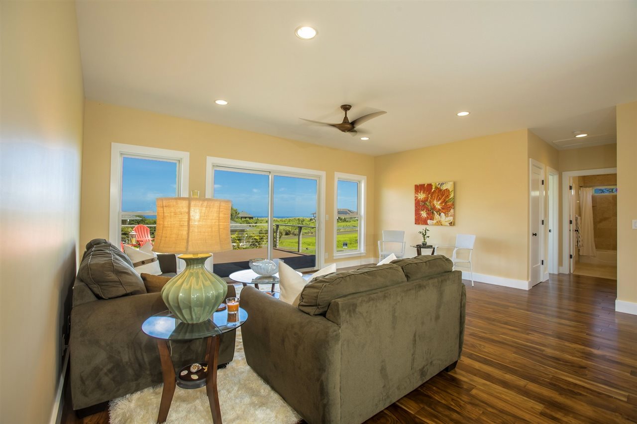 1351 Hookili Road, Unit A Haiku, HI 96708 - Photo 3 of 29 a living room with furniture and wooden floor