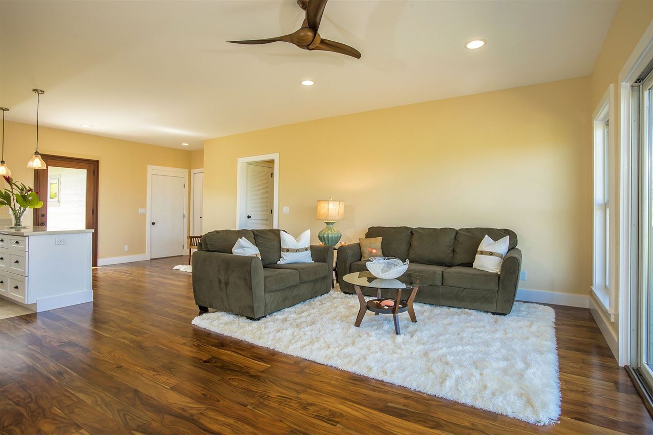 1351 Hookili Road, Unit A Haiku, HI 96708 - Photo 9 of 29 a living room with furniture and a wooden floor