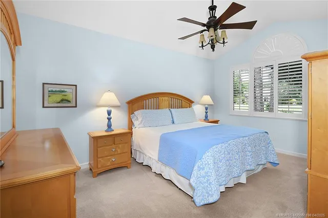 a bathroom with a sink a tub and a mirror