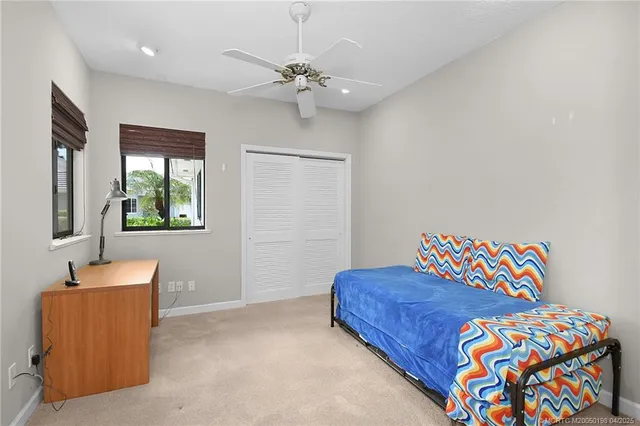 a view of a patio with a dining table and chairs