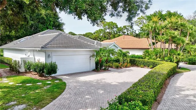 a view of a lake with a yard