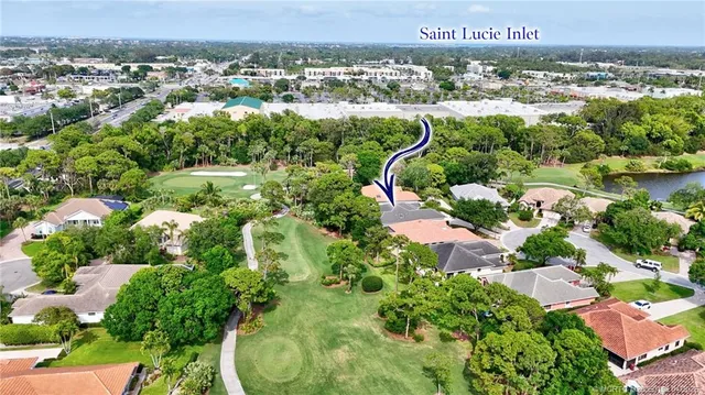 a view of a swimming pool in a yard