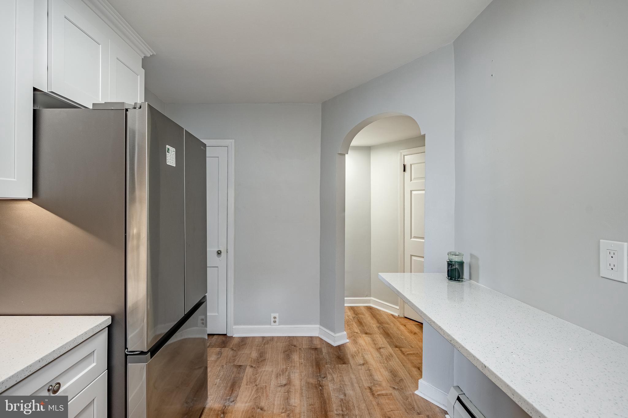 4234 Valley Road, Unit 1 Drexel Hill, PA 19026 - Photo 11 of 19 a room with a bed and a mirror