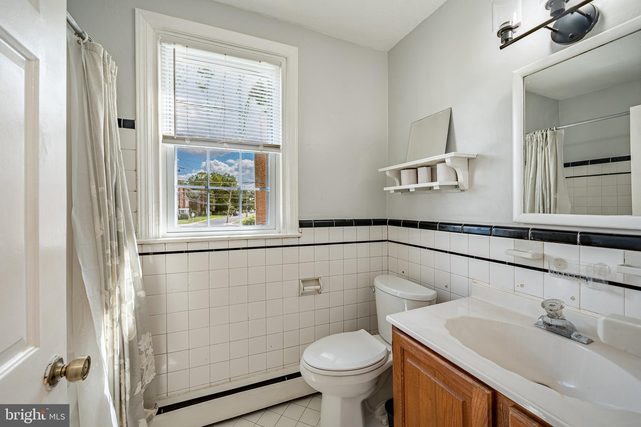 4234 Valley Road, Unit 1 Drexel Hill, PA 19026 - Photo 14 of 19 a bathroom with a sink toilet and shower