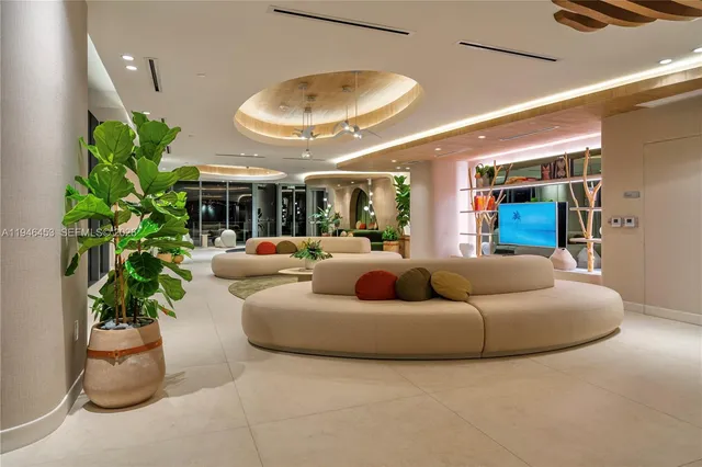 a swimming pool with outdoor seating and yard