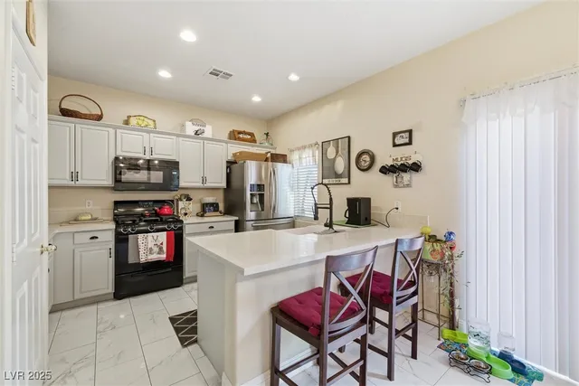 $305,000 | 6320 Blowing Sky Street, Unit 102, North Las Vegas, NV 89081