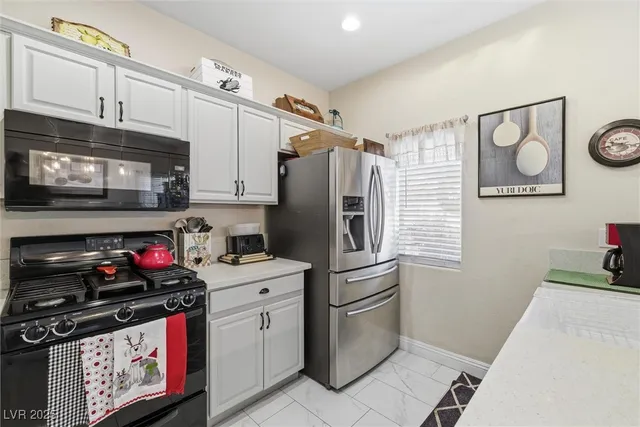 $305,000 | 6320 Blowing Sky Street, Unit 102, North Las Vegas, NV 89081