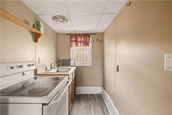 a bathroom with a sink a vanity and a mirror