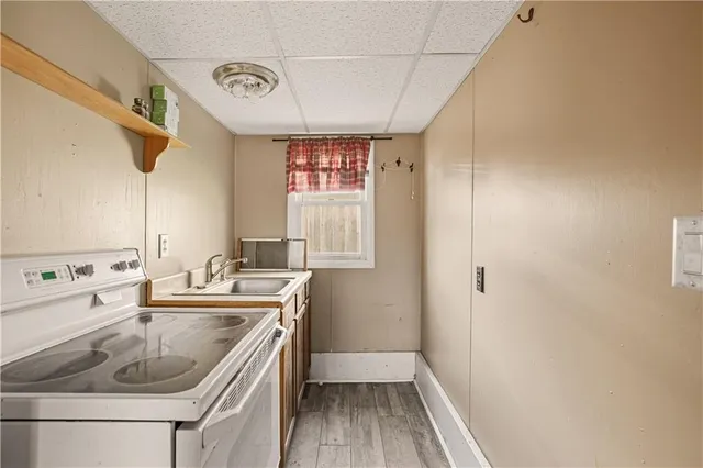 a bathroom with a sink a vanity and a mirror