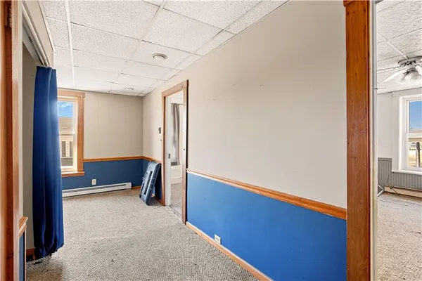 a view of an empty room and window