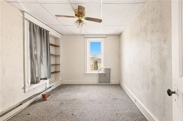 a view of a hallway with closet area