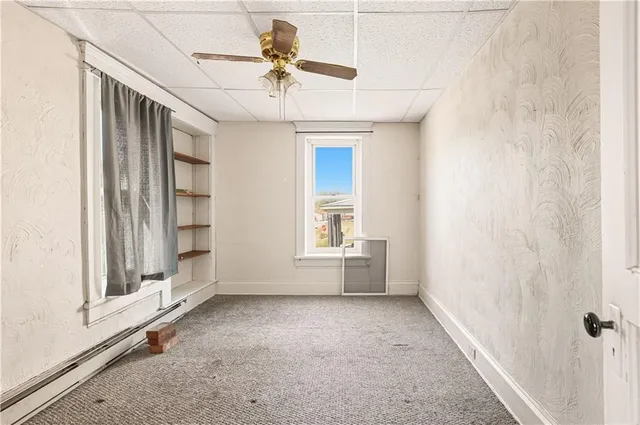 a view of a hallway with closet area