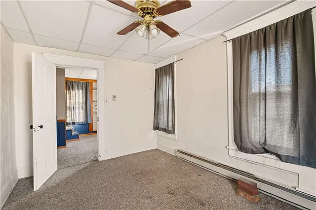 a view of a hallway with closet