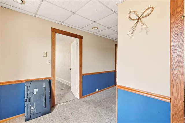 a view of a balcony with wooden floor