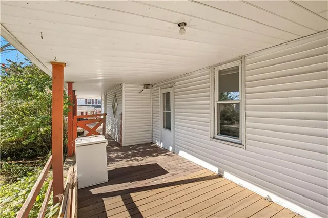 a view of yard with swimming pool and green space