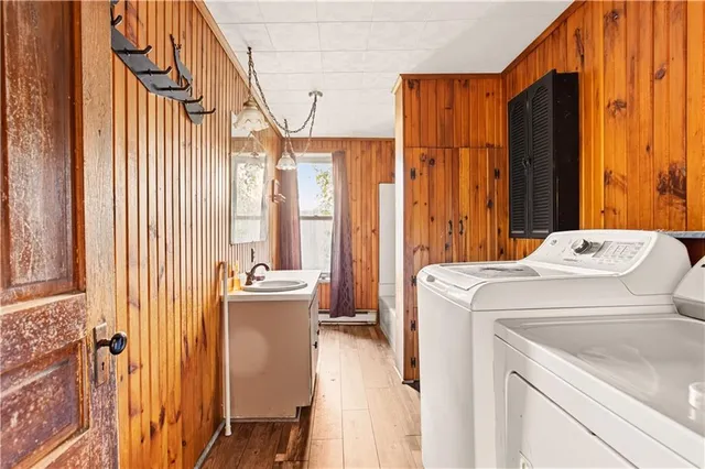 a utility room with dryer and washer