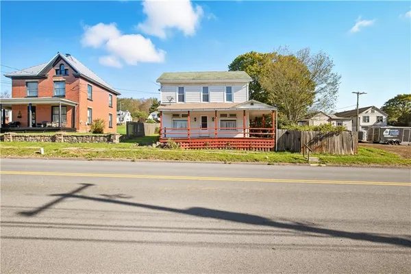 a view of a building with a street