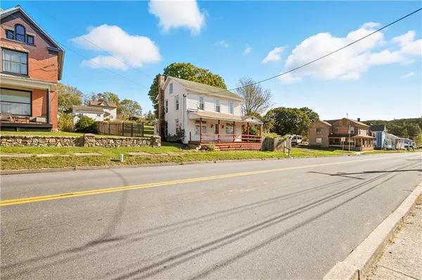 a view of a building with a street
