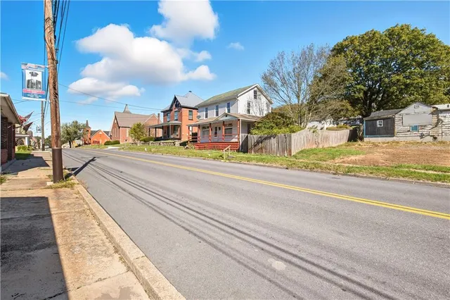 a view of a street with houses