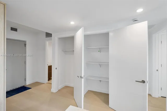 a view of small space with racks on the wall