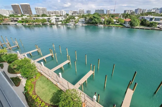 an aerial view of a house with a lake view