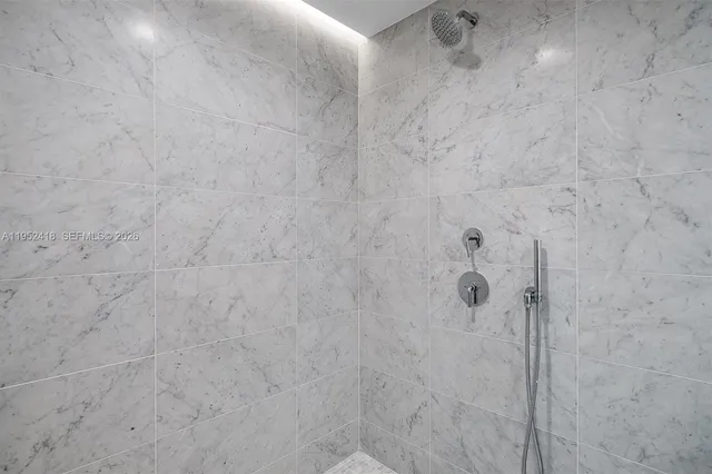 a view of a balcony with city and lake view