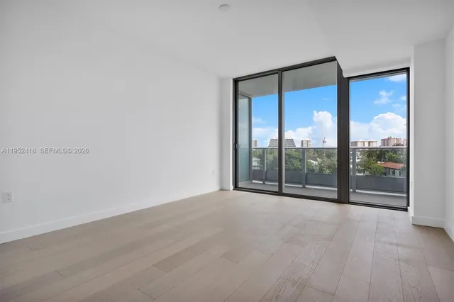 a view of hallway with closet