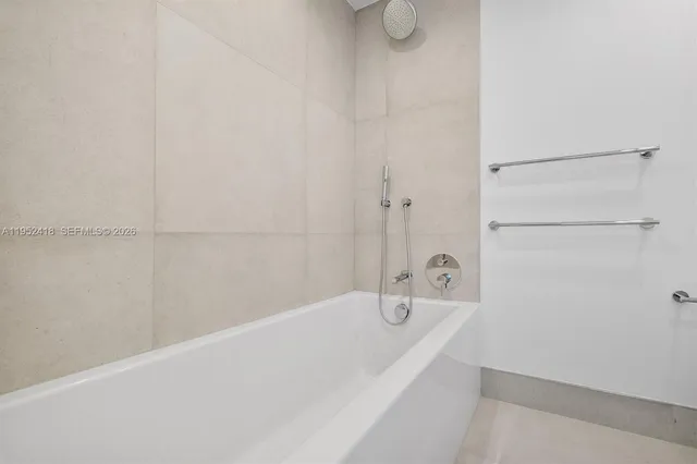 a view of a house with a backyard and a yard