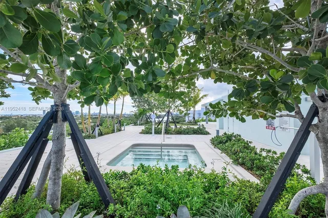 a view of livingroom with furniture and windows